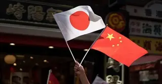 বেইজিংয়ের কূটনৈতিক ও বাণিজ্যিক নিষেধাজ্ঞায় বিপাকে টোকিও